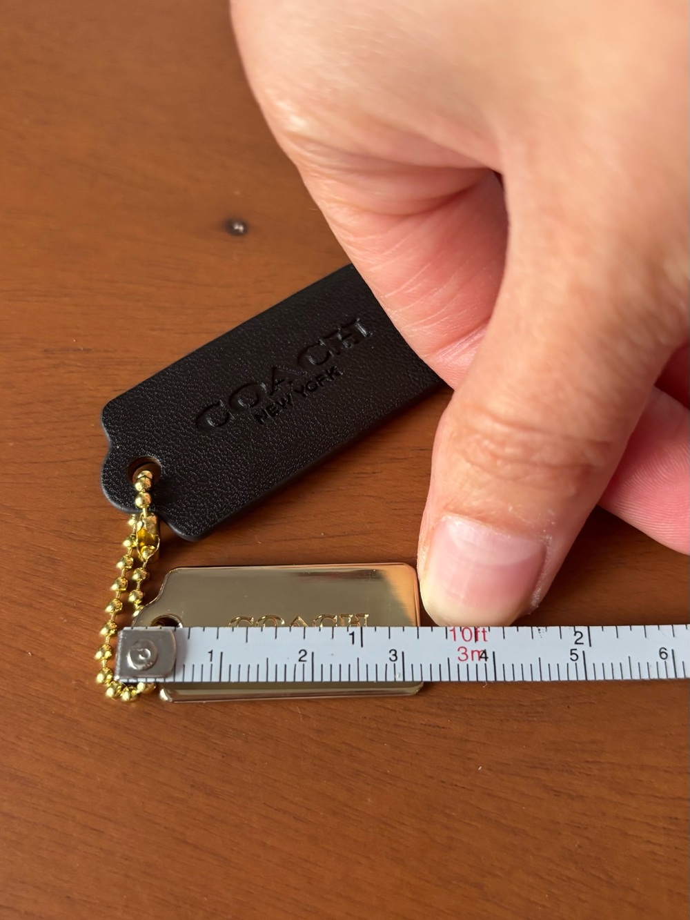Coach Black Leather and Gold-Tone Metal Tag Keychain - Picture 4 of 6
